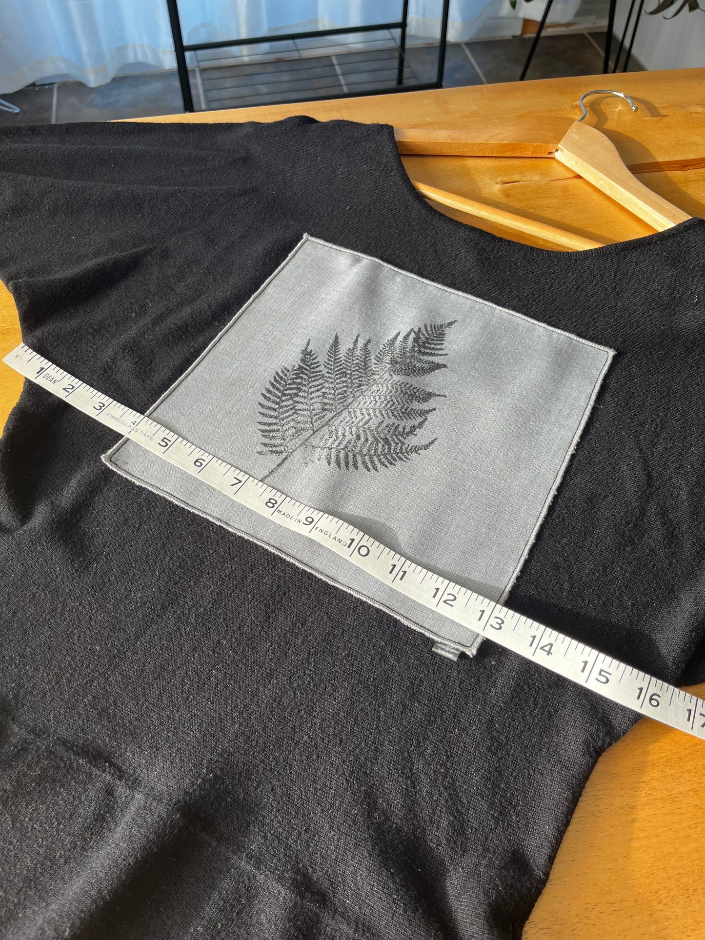 Tricot noir «fougère» médium