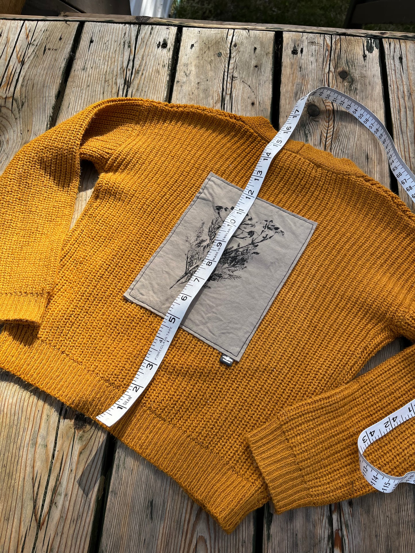 Tricot moutarde « asters sauvages » 4 ans